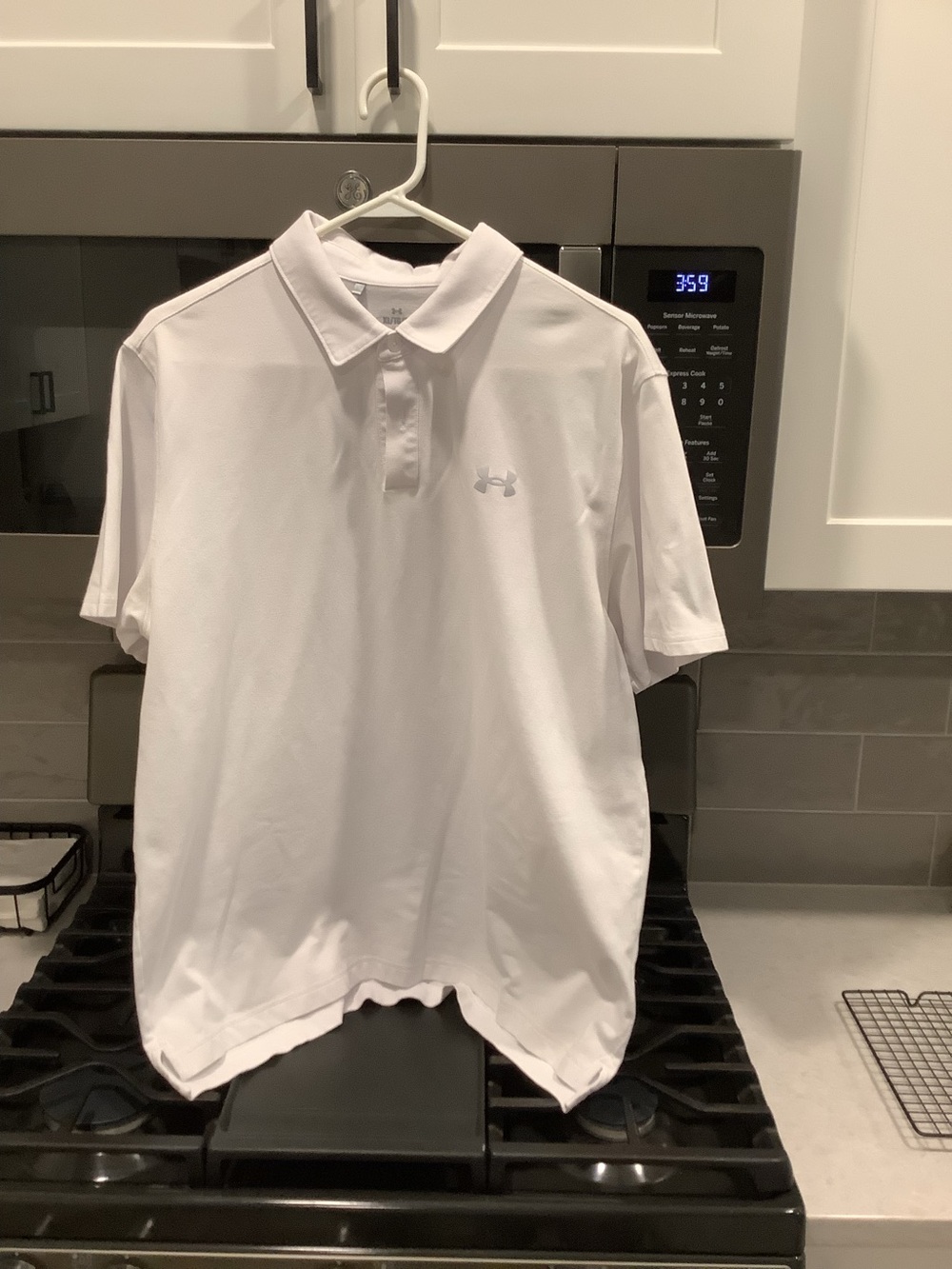 Under Armour Men’s white polo